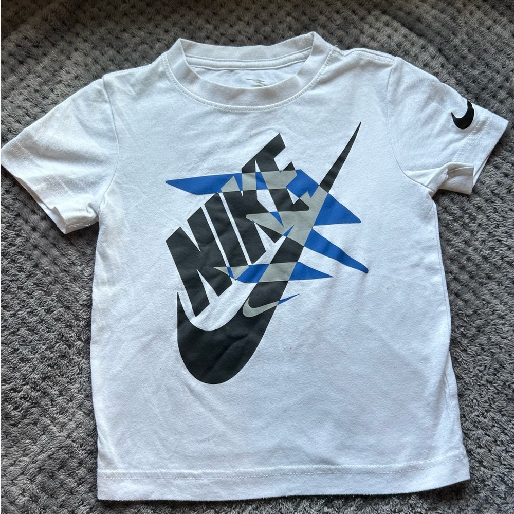 Nike Kids White Tee with Blue and Black Graphic